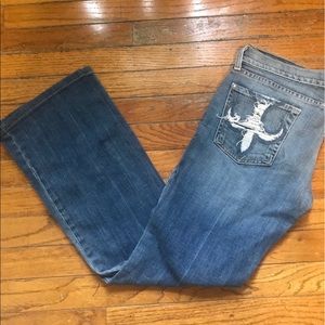 Embroidered pocket bootcut jeans